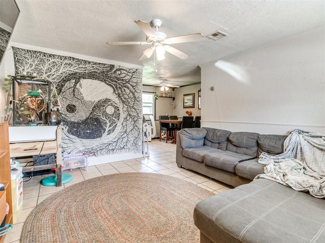 5305 S Drexel Ave, Oklahoma City, OK 73119 - tiled living room featuring a ceiling fan, crown molding, and a textured ceiling