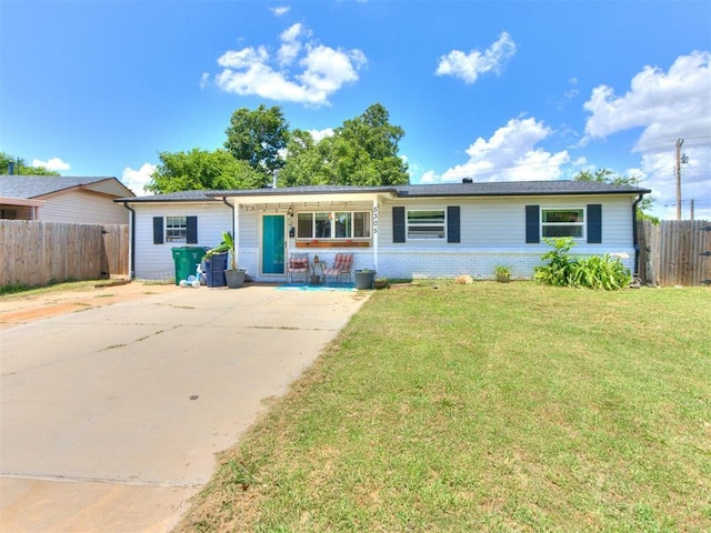 5305 S Drexel Ave, Oklahoma City, OK 73119 - ranch-style home with covered porch, brick siding, and driveway