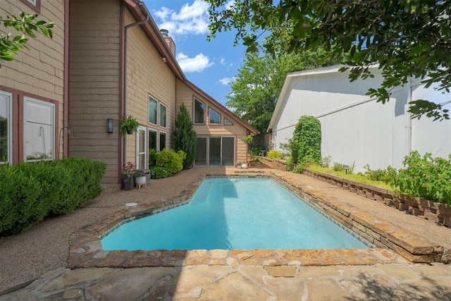 1615 Fox Hollow Rdg, Oklahoma City, OK 73131 - swimming pool featuring a patio area