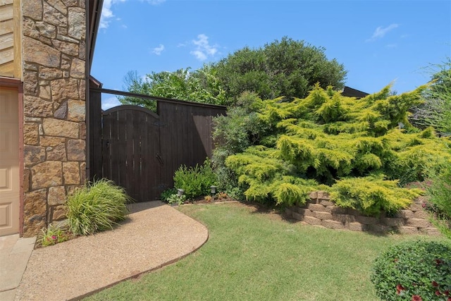 1615 Fox Hollow Rdg, Oklahoma City, OK 73131 - view of grassy yard with a gate