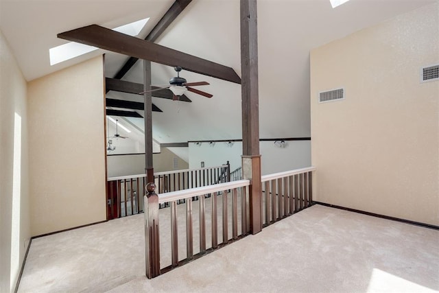 1615 Fox Hollow Rdg, Oklahoma City, OK 73131 - spare room featuring a skylight, carpet, and a ceiling fan
