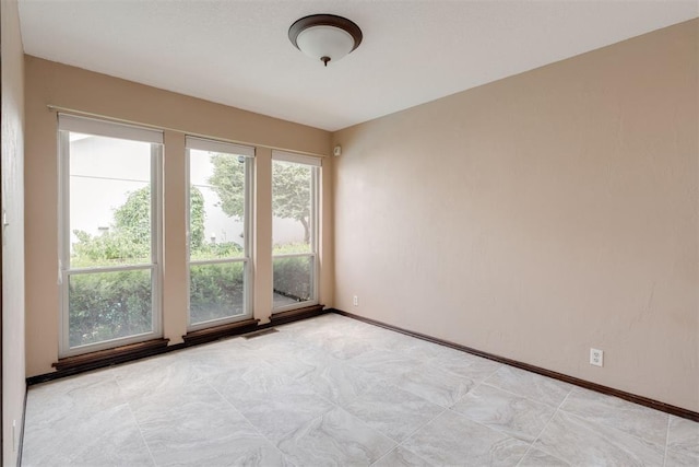 1615 Fox Hollow Rdg, Oklahoma City, OK 73131 - unfurnished room with baseboards