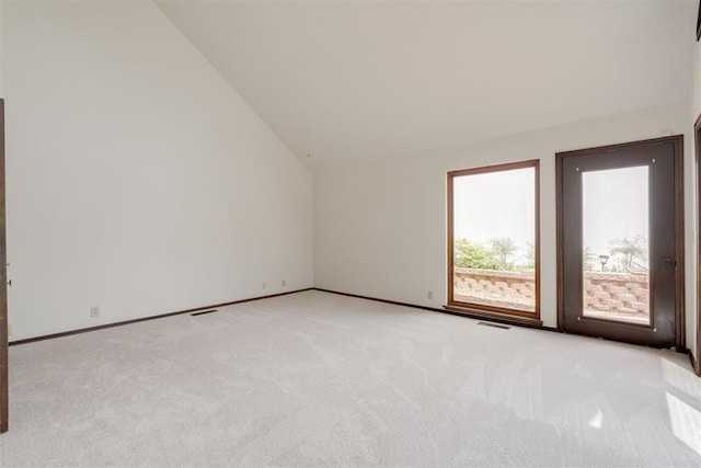 1615 Fox Hollow Rdg, Oklahoma City, OK 73131 - additional living space featuring vaulted ceiling and light carpet