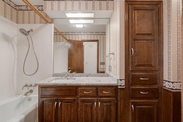 1615 Fox Hollow Rdg, Oklahoma City, OK 73131 - full bath featuring wallpapered walls, vanity, and shower / washtub combination