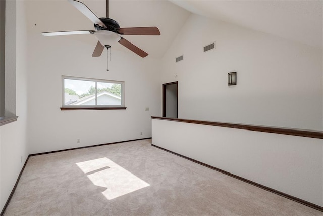 1615 Fox Hollow Rdg, Oklahoma City, OK 73131 - carpeted empty room with high vaulted ceiling and ceiling fan