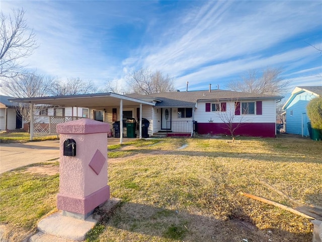 601 SE 70th St, Oklahoma City, OK 73149 - ranch-style house with a carport, a front lawn, and driveway