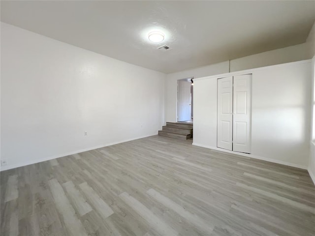 601 SE 70th St, Oklahoma City, OK 73149 - unfurnished bedroom with light wood-type flooring and a closet