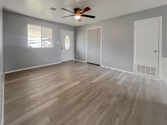 601 SE 70th St, Oklahoma City, OK 73149 - foyer with ceiling fan and wood finished floors
