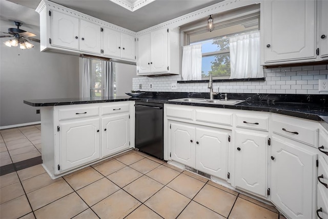 12612 Bannockburn Pl, Oklahoma City, OK 73142 - kitchen with dishwasher, a peninsula, white cabinets, ceiling fan, and healthy amount of natural light
