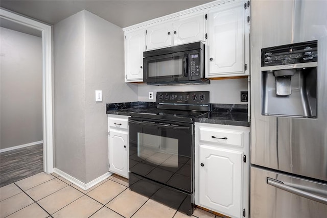 12612 Bannockburn Pl, Oklahoma City, OK 73142 - kitchen with black appliances, dark countertops, white cabinetry, and light tile patterned floors