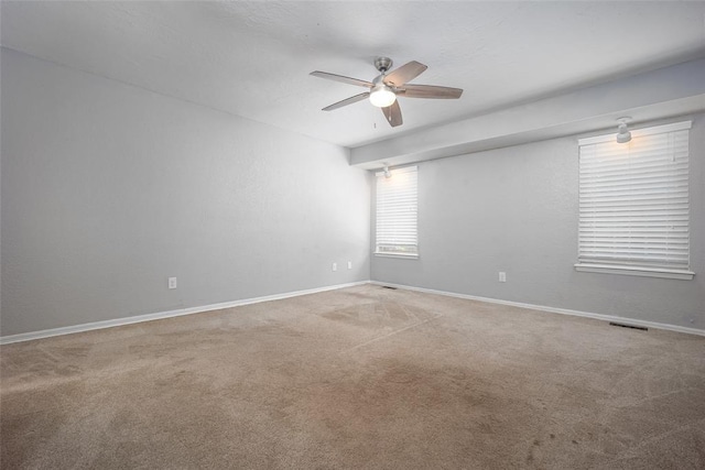 12612 Bannockburn Pl, Oklahoma City, OK 73142 - empty room with a ceiling fan and carpet flooring