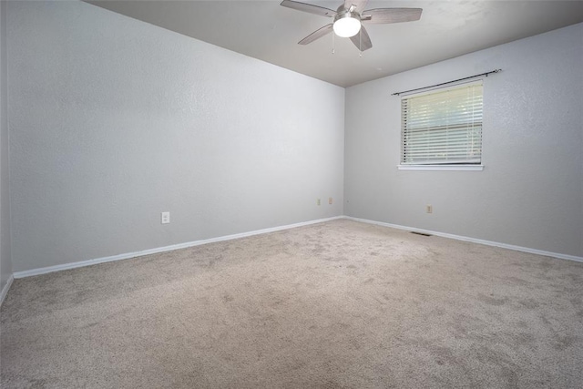 12612 Bannockburn Pl, Oklahoma City, OK 73142 - carpeted empty room featuring a ceiling fan and baseboards