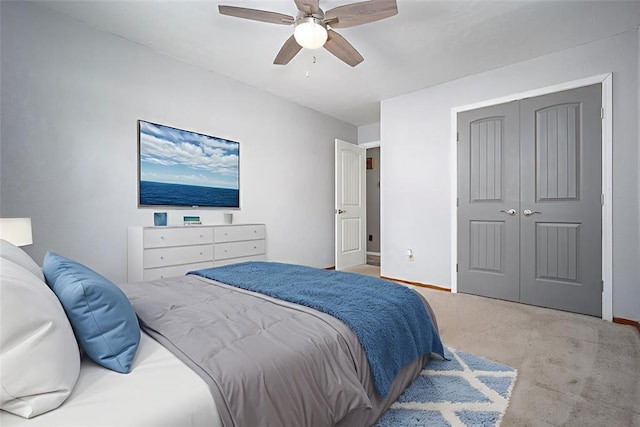 12612 Bannockburn Pl, Oklahoma City, OK 73142 - bedroom with a closet, carpet floors, and a ceiling fan