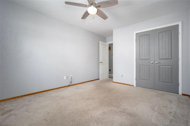 12612 Bannockburn Pl, Oklahoma City, OK 73142 - unfurnished bedroom featuring carpet, a closet, and ceiling fan