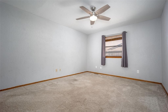 12612 Bannockburn Pl, Oklahoma City, OK 73142 - spare room with ceiling fan and carpet flooring