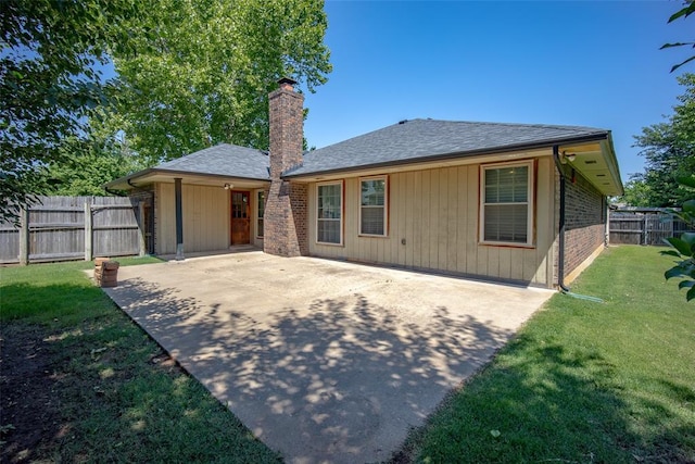 12612 Bannockburn Pl, Oklahoma City, OK 73142 - rear view of house featuring a patio area, a chimney, and roof with shingles