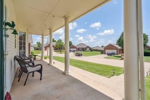 11416 Leslie Beachler Ln, Midwest City, OK 73130 - porch featuring a residential view
