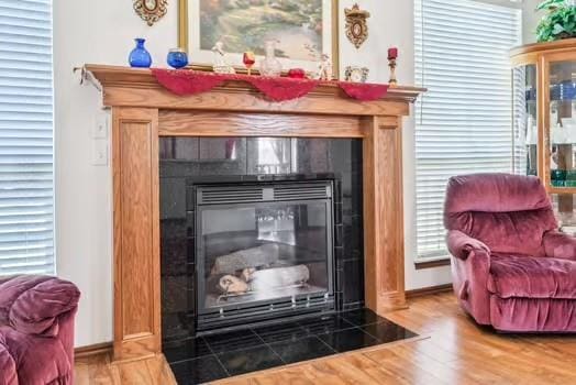 11416 Leslie Beachler Ln, Midwest City, OK 73130 - detailed view of a fireplace and wood finished floors