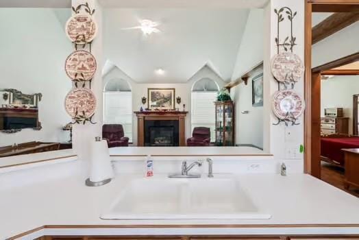 11416 Leslie Beachler Ln, Midwest City, OK 73130 - kitchen featuring a fireplace, lofted ceiling, and open floor plan
