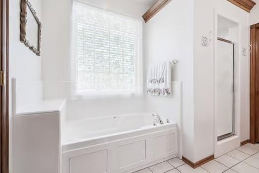 11416 Leslie Beachler Ln, Midwest City, OK 73130 - full bath with a shower stall, a garden tub, and tile patterned floors
