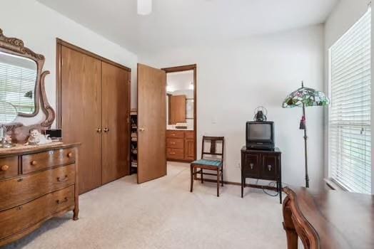 11416 Leslie Beachler Ln, Midwest City, OK 73130 - living area featuring light carpet and ceiling fan