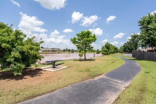 11416 Leslie Beachler Ln, Midwest City, OK 73130 - view of home's community featuring a lawn and a water view