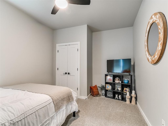 15109 Caspian Ln, Edmond, OK 73013 - bedroom featuring carpet, a closet, and ceiling fan