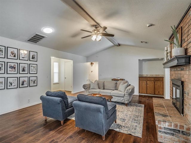 1008 S Neptune Rd, Edmond, OK 73003 - living room with a ceiling fan, wood finished floors, and a brick fireplace
