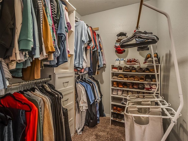 1008 S Neptune Rd, Edmond, OK 73003 - spacious closet featuring carpet