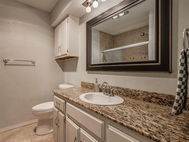 1008 S Neptune Rd, Edmond, OK 73003 - full bathroom with vanity, a tile shower, and tile patterned floors