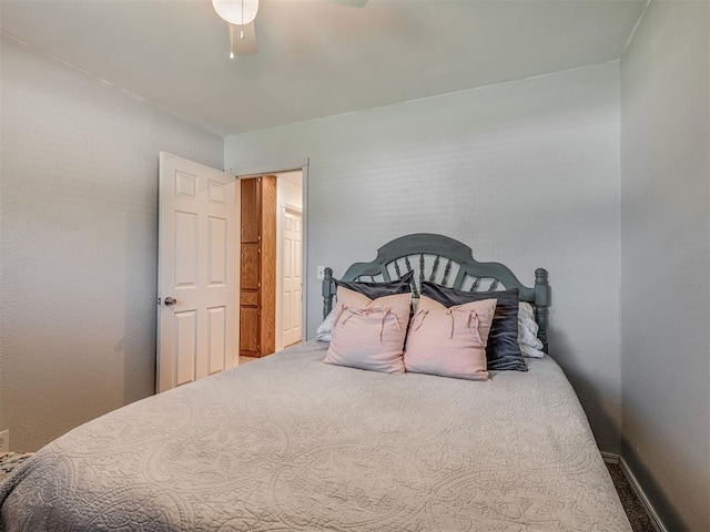 1008 S Neptune Rd, Edmond, OK 73003 - bedroom with carpet and ceiling fan