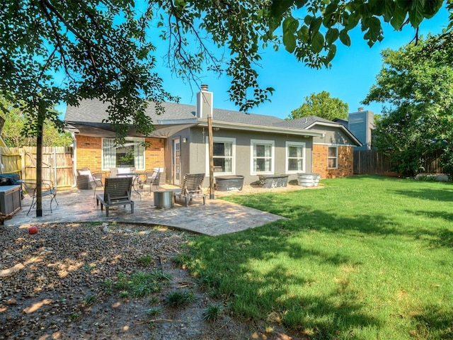 1008 S Neptune Rd, Edmond, OK 73003 - rear view of house featuring a chimney, a fenced backyard, brick siding, a patio area, and roof with shingles