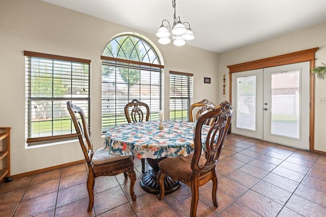 125 NW 147th St, Edmond, OK 73013 - dining room with a chandelier and french doors