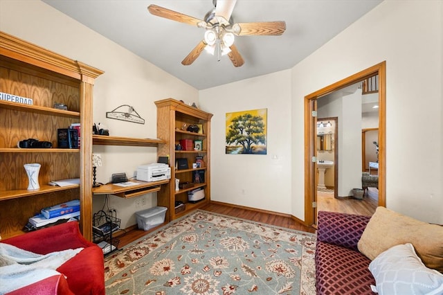 125 NW 147th St, Edmond, OK 73013 - home office with wood finished floors and a ceiling fan