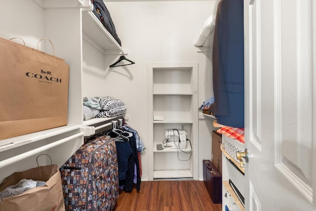 125 NW 147th St, Edmond, OK 73013 - spacious closet featuring wood finished floors