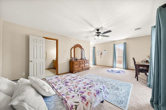 125 NW 147th St, Edmond, OK 73013 - bedroom with light colored carpet and a ceiling fan