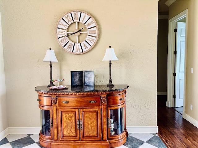 1004 Reginald Dr, Norman, OK 73072 - detailed view of baseboards and wood finished floors