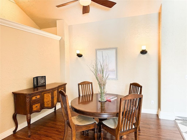 1004 Reginald Dr, Norman, OK 73072 - dining room with wood finished floors, a ceiling fan, and vaulted ceiling