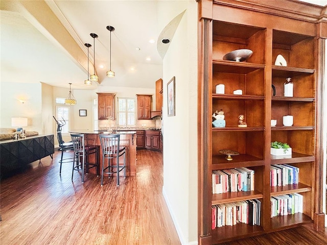1004 Reginald Dr, Norman, OK 73072 - dining area with light wood finished floors and built in features