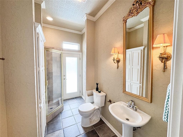 1004 Reginald Dr, Norman, OK 73072 - bathroom featuring crown molding, a shower stall, a textured wall, and tile patterned flooring