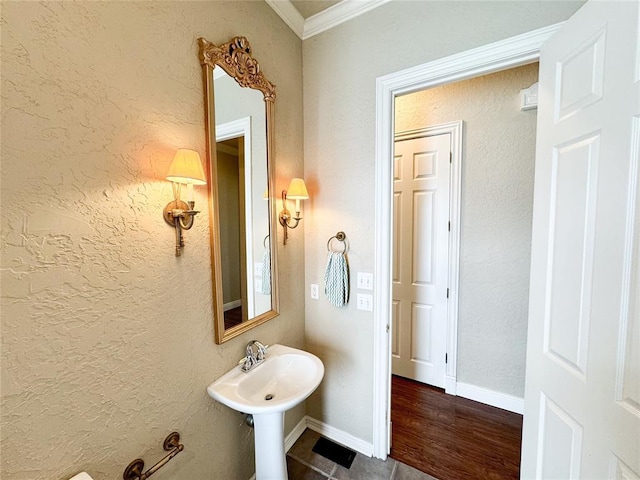 1004 Reginald Dr, Norman, OK 73072 - bathroom with crown molding and wood finished floors