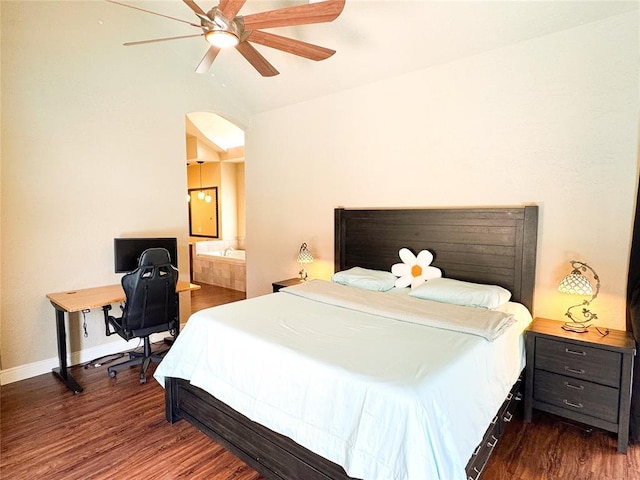 1004 Reginald Dr, Norman, OK 73072 - bedroom featuring wood finished floors, lofted ceiling, ceiling fan, ensuite bath, and a desk