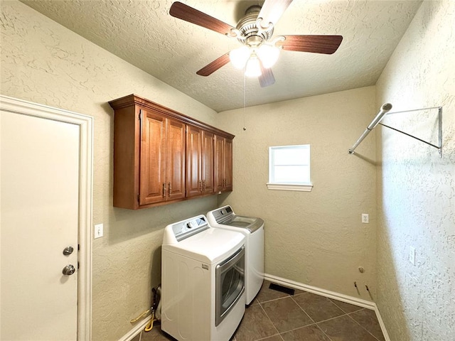 1004 Reginald Dr, Norman, OK 73072 - laundry room with cabinet space, washer and dryer, a textured ceiling, dark tile patterned flooring, and ceiling fan