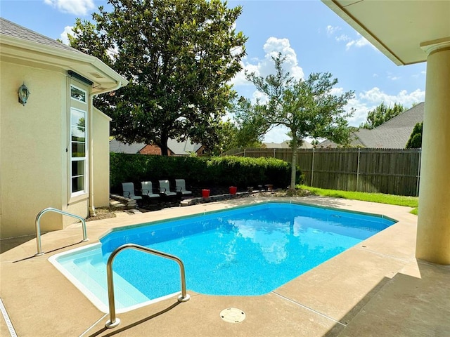1004 Reginald Dr, Norman, OK 73072 - view of swimming pool with a fenced backyard and a patio area
