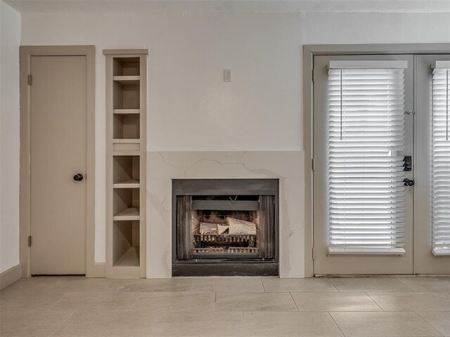 11550 N May Ave Unit 108, Oklahoma City, OK 73120 - detailed view of built in features and a high end fireplace