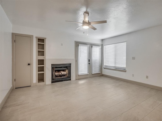 11550 N May Ave Unit 108, Oklahoma City, OK 73120 - unfurnished living room with ceiling fan, a fireplace, and light tile patterned floors