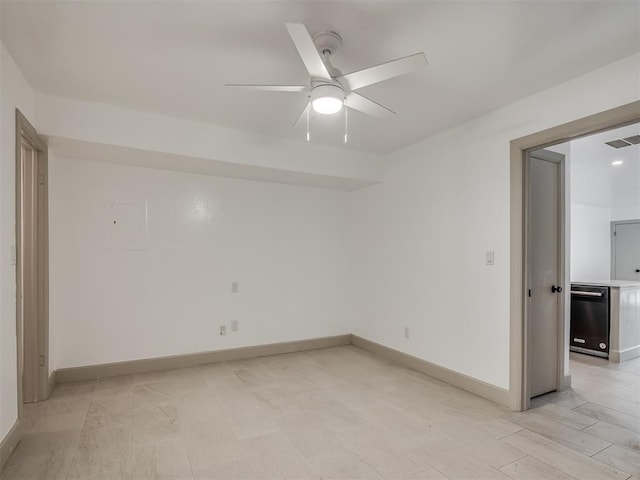 11550 N May Ave Unit 108, Oklahoma City, OK 73120 - spare room featuring a ceiling fan and baseboards
