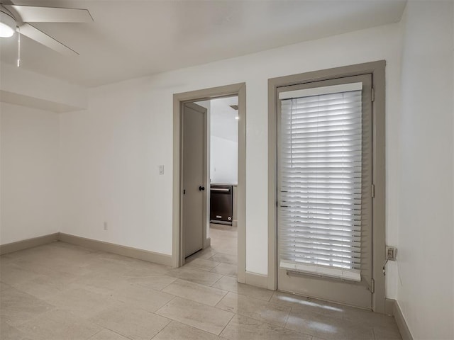 11550 N May Ave Unit 108, Oklahoma City, OK 73120 - empty room with ceiling fan and baseboards