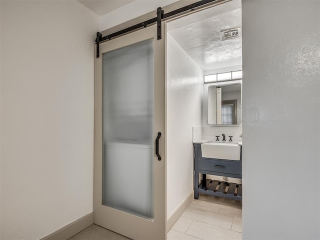 11550 N May Ave Unit 108, Oklahoma City, OK 73120 - bathroom featuring vanity and tile patterned floors