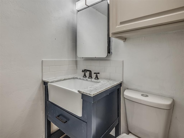 11550 N May Ave Unit 108, Oklahoma City, OK 73120 - bathroom with tasteful backsplash and vanity